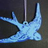 swallow stencil painted ornament blue