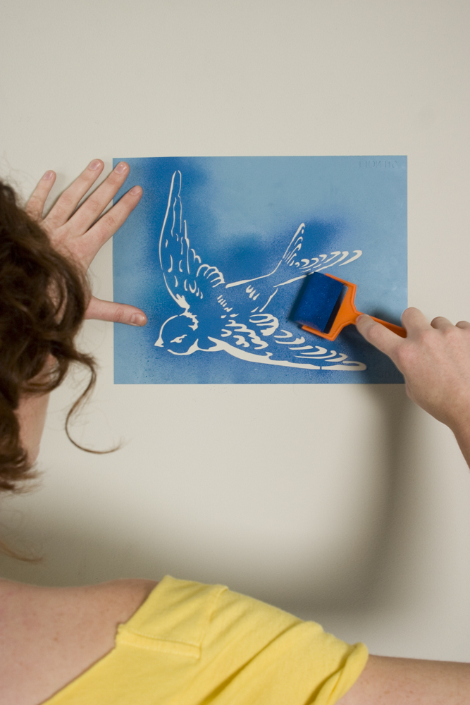 swallow stencil applying on wall