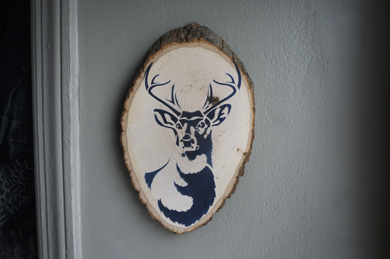 antlered deer stenciled Wood slab