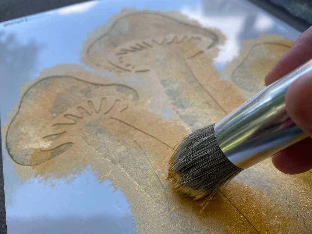 Painting a mushroom stencil