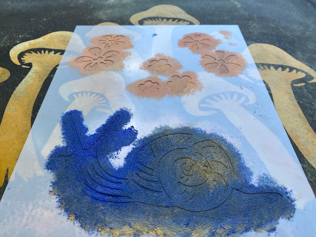 Painting a snail stencil