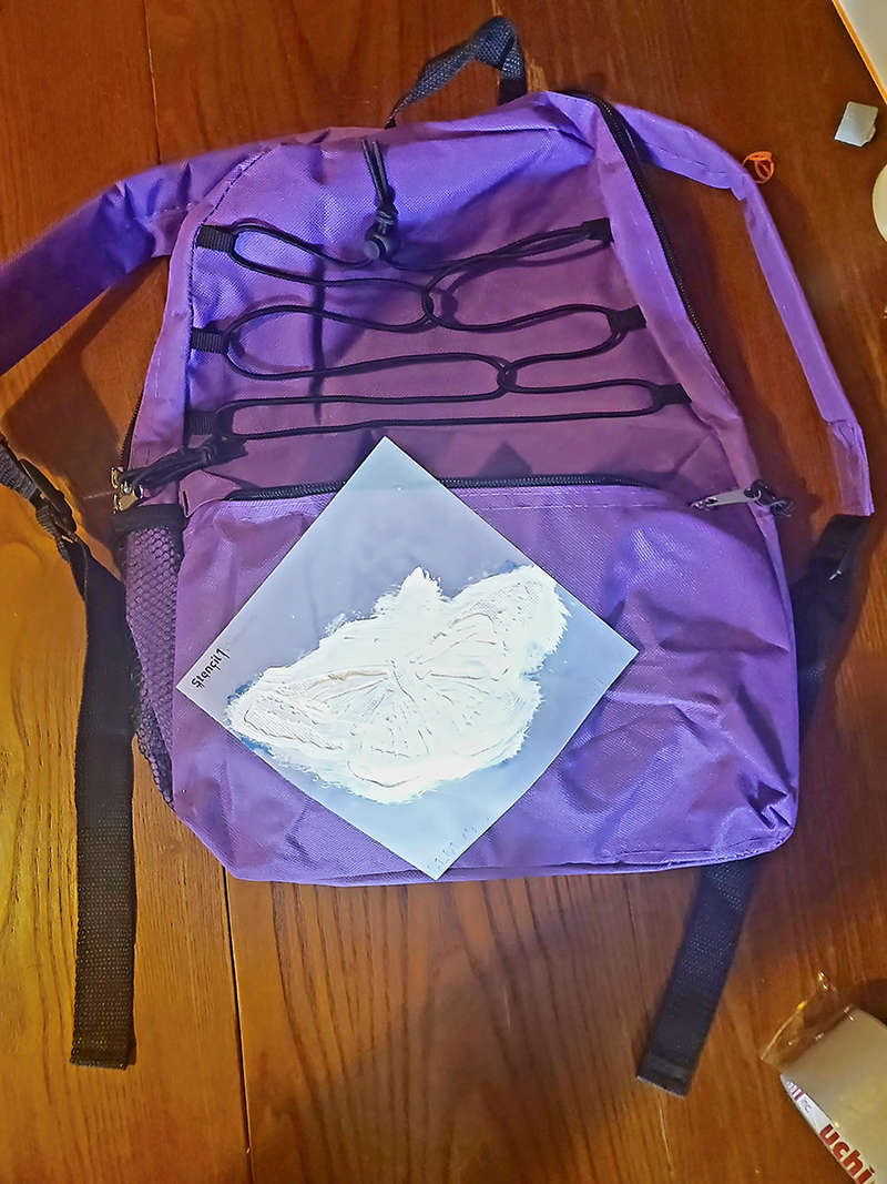 stenciled backpack